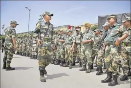  ??  ?? BSF personnel stand guard near the CBI court that will pronounce verdict in the rape case against Dera Sacha Sauda chief Gurmeet Ram Rahim Singh, in Panchkula on Thursday.