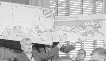  ?? Jose Luis Magana / Associated Press ?? Sen. Bill Cassidy, R-La., shows graphics during a hearing Wednesday on an Arctic drilling measure.