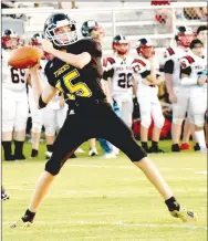  ??  ?? Carte throws the football in a 24-6 nonconfere­nce win over Pea Ridge in the junior high football season opener for both teams Thursday.