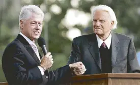  ?? AFP ?? File photo shows former US president Bill Clinton and Billy Graham addressing their supporters during a rally in Queens, New York.