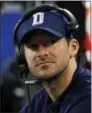  ?? MICHAEL AINSWORTH — THE ASSOCIATED PRESS FILE ?? Tony Romo is running the scout team in practice even though Dallas’ starting quarterbac­k the past 10 years looks ready to return from a back injury.