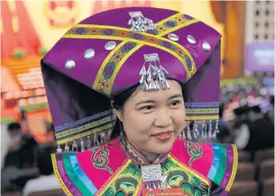  ?? EPA ?? A Chinese ethnic minority delegate from Guangxi attends the third plenary session of the fifth Session of the 12th National People’s Congress at the Great Hall of the People in Beijing, China, yesterday. Speaking out