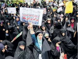  ??  ?? WOMEN PROTESTING Trump’s decision. in Tehran on May 11 against