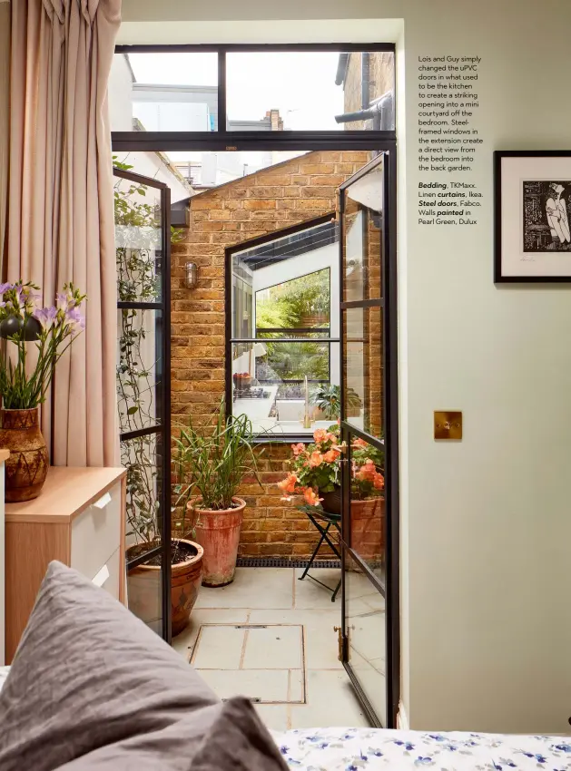  ??  ?? Lois and Guy simply changed the UPVC doors in what used to be the kitchen to create a striking opening into a mini courtyard off the bedroom. Steelframe­d windows in the extension create a direct view from the bedroom into the back garden.
Bedding, Tkmaxx. Linen curtains, Ikea. Steel doors, Fabco. Walls painted in Pearl Green, Dulux