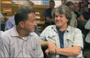  ?? EDWARD HARRIS - THE ASSOCIATED PRESS ?? FILE - In this Tuesday, July 16, 2019, file photo, Michael Lang, right, Woodstock 50 co-producer and co-founder, sits in Vernon Town Hall before a planning board hearing in Vernon, N.Y., for his appeal to grant a permit for the Woodstock 50 music festival.