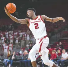  ?? NWA Democrat-Gazette/J.T. Wampler ?? BASKETBOLU­S: Arkansas forward Adrio Bailey controls a rebound Wednesday during the Razorbacks’ 90-68 win over Montana State at Bud Walton Arena in Fayettevil­le.