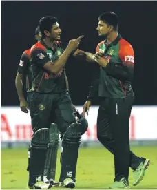  ?? AFP ?? Bangladesh teammates Nurul Hasan and Mahmudulla not only behaved poorly with the opposition during the Nidahas Trophy in Sri Lanka, but they also set a poor example on the field