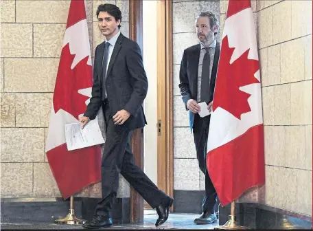  ?? JUSTIN TANG/ THE CANADIAN PRESS FILE PHOTO ?? Prime Minister Justin Trudeau and Gerald Butts have been friends since their student days at McGill University. Butts resigned as Trudeau’s principal secretary on Monday, maintainin­g there was no political interferen­ce in the SNCLavalin case.