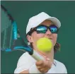  ?? ?? Fernanda Contreras Gomez hits a return to Magda Linette at Wimbledon on Monday.*AP