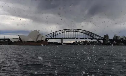  ?? Photograph: Dean Lewins/AAP ?? Storm clouds build over Sydney on Monday as a return to cooler weather, rain and thunder storms was forecast for NSW.