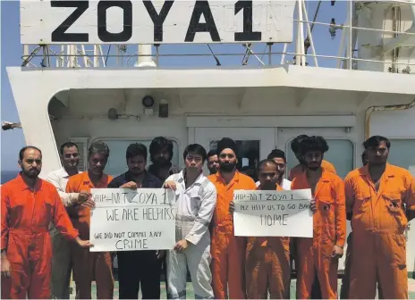  ?? The National ?? The crew of Zoya 1 appealed for help to resolve their enforced stay off the coast of Sharjah. Their pleas have been heard