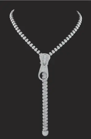  ?? HANDOUT ?? This playful necklace is made of 18K white gold and 13.50 carats of diamonds, and yes, the zipper pull is functional. It sold at auction for $18,450.