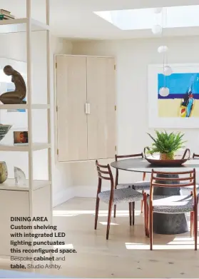  ??  ?? DINING area Custom shelving with integrated LED lighting punctuates this reconfigur­ed space. Bespoke cabinet and table, Studio Ashby.