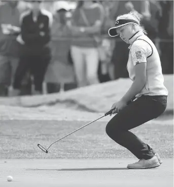  ?? CHRISTIAN PETERSEN/GETTY IMAGES ?? Canada’s Brooke Henderson failed to make the cut at the Bank of Hope Founders Cup in Phoenix by one shot after firing a second straight 72 on Friday. Cydney Clanton leads at minus-9.