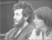  ?? ASSOCIATED PRESS FILE PHOTO ?? Prosecutor­s said Monday they will seek the death penalty for James Holmes (left, with defense attorney Tamara Brady) in the Aurora, Colo., movie theater shooting case.