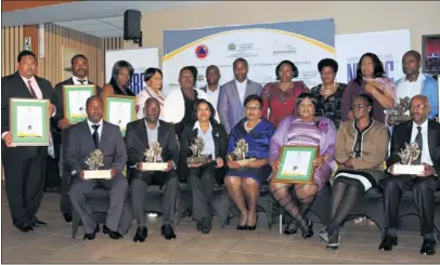  ??  ?? PROUD RECIPIENTS: Limpopo MEC Clifford Motsepe (grey suit, back row) and the Govan Mbeki Excellence Awards winners.