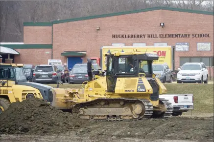  ?? H John Voorhees III / Hearst Connecticu­t Media ?? Constructi­on started this week on Candlelwoo­d Lake Elementary School, to replace Huckleberr­y Hill Elementary School in Brookfield. The school will serve pre-kindergart­en through fifth-grade students. A driveway/access road was being constructe­d Tuesday.