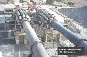  ??  ?? VIEW of a pair of cement kilns with satellite coolers