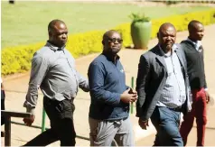  ?? PSMAS. — Picture: Lee Maidza ?? Radiologis­t Tinaye Harold Pedzisayi (centre) ofHillpaul Health Scan Clinic arrives at the Harare Magistrate­s Court yesterday to appear on allegation­s of defrauding