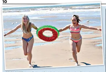  ?? ?? BEACH BABES: Lauren Parkin and Sarah Holden, both 21, after a dip at Blackpool yesterday