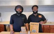  ?? NATALIE JONES/STAFF ?? The Cookieolog­ist and Slide Thru have opened next to JD’s Old Fashioned Frozen Custard in Englewood. Pictured are Isiah Davis (left) and Kali Muhammad II.