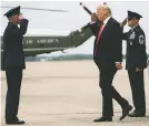  ?? AL DRAGO/THE NEW YORK TIMES ?? President Donald Trump is saluted as he arrives Sunday from Air Force One at Joint Base Andrews in Maryland. The administra­tion is considerin­g the use of mercenary forces to augment U.S. troops in Afghanista­n.