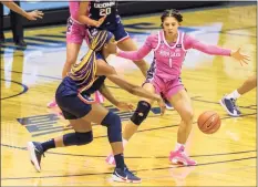  ?? Georgetown Athletics / Contribute­d Photo ?? UConn’s Aaliyah Edwards passes around Georgetown’s Kelsey Ransom on Friday.