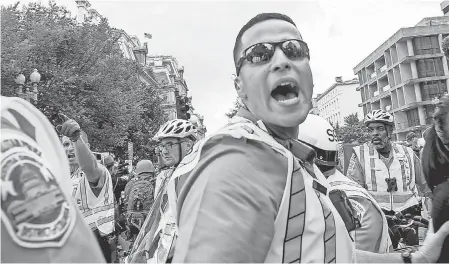  ?? CAMILLE FINE/USA TODAY NETWORK ?? Police kept tight order during the Unite the Right 2 rally. Things got tense after it ended.