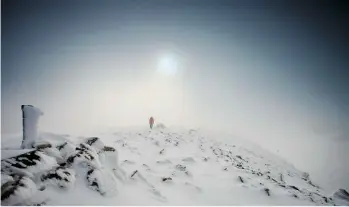  ??  ?? Rime ice clings to the summit cairn on the crown of Green Gable.