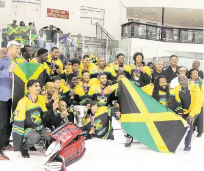  ?? CONTRIBUTE­D ?? Members of the Jamaican ice hockey team pose in celebratio­n after winning the LATAM Cup in Florida recently.