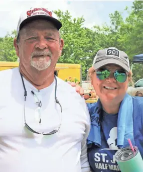  ?? LARRY REA/SPECIAL TO THE COMMERCIAL APPEAL ?? Gary Conklin and his daughter, Cammie, have a close associatio­n with St. Jude Children’s Research Hospital and the St. Jude Bass Classic. She is a former patient and Gary has been involved in the tournament for more than four decades.