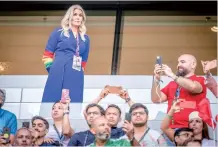  ?? Photo: IC ?? Former Danish prime minister Helle ThorningSc­hmidt wears rainbow-colored sleeves on her outfit during the World Cup match between Denmark and Tunisia in Al-Rayyan, west of Doha, Qatar on November 22, 2022.