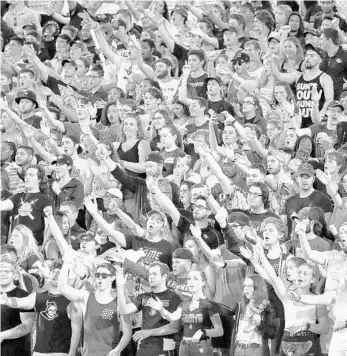  ?? JOHN RAOUX/AP ?? Fans cheer during the first half of UCF’s game against East Carolina during the 2019 season.