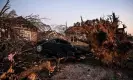  ?? Photograph: Chandan Khanna/AFP/Getty Images ?? The remains of a house and cars entangled in tree limbs in Rolling Fork.