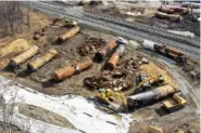  ?? AP PHOTO/MATT FREED ?? An aerial view of the scene is shown Friday as cleanup continues at the site of a Norfolk Southern freight train derailment that happened on Feb. 3 in East Palestine, Ohio.