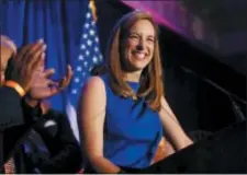  ?? BOB KARP — THE DAILY RECORD VIA AP ?? Mikie Sherrill gives her acceptance speech, winning for the Democrats a seat held by Republican­s for more than 30 years, Tuesday in Parsippany, N.J. Sherrill defeated Republican candidate, state Assemblyma­n Jay Webber in the 11th District.