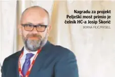  ?? BORNA FILIĆ/PIXSELL ?? Nagradu za projekt Pelješki most primio je čelnik HC-a Josip Škorić