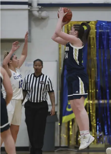  ?? NICOLAUS CZARNECKI PHOTOS / HERALD STAFF ?? GOING UP: Archbishop Williams’ Jessica Knight takes a jump shot during Friday’s win over Norwell. Left: Meg Marcel (right) of Archbishop Williams guards Norwell’s Anna Kirchner out on the perimeter.