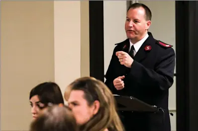  ?? Staff photo by Hunt Mercier ?? ■ Salvation Army Commander Major David Feeser speaks Tuesday to elected officials about homelessne­ss and what can be done to help out the community at the quarterly Joint Texarkana Community Committee in Texarkana, Texas. Officials heard from experts and advocates who work closely with the homeless about issues and improvemen­ts that need to happen to help support the community.