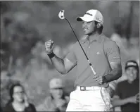  ??  ?? Jason Day celebrates on the 23rd hole after winning his championsh­ip match against Victor Dubuisson during the Match Play Championsh­ip golf tournament Sunday in Marana, Ariz.