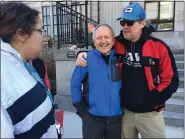  ?? CARL HESSLER JR. — MEDIANEWS GROUP ?? Former Montgomery County Chief Public Defender Dean Beer (center) receives support from criminal justice reform advocates during rally to protest his firing.