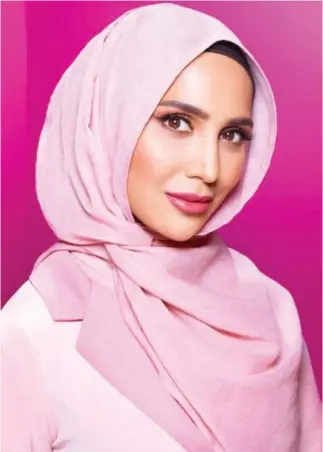  ??  ?? The L’Oreal Paris’ new hair campaign features hijab-wearing British beauty blogger Amena Khan. (Photo: L’Oreal Paris Elvive)