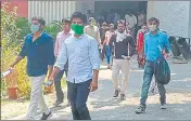  ?? HT PHOTO ?? Candidates coming out of the exam centre in Prayagraj.