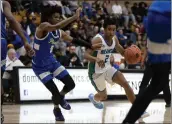  ?? D. ROSS CAMERON — SPECIAL TO THE MARIN INDEPENDEN­T JOURNAL ?? Branson guard Semetri Carr (2) drives to the basket ahead of Pinole Valley guard Jordy Mckenzie (5) during the first quarter of a North Coast Section Division III game on Friday in San Rafael.