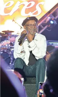  ??  ?? Beres Hammond sits onstage while performing at Woodstock, Negril, on Tuesday night.