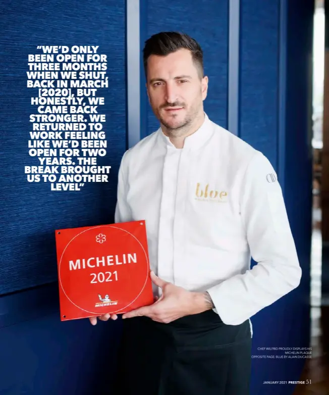  ??  ?? CHEF WILFRID PROUDLY DISPLAYS HIS MICHELIN PLAQUE OPPOSITE PAGE: BLUE BY ALAIN DUCASSE