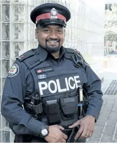  ?? TORONTO POLICE SERVICE HANDOUT/THE CANADIAN PRESS ?? Toronto Police Const. Niran Jeyanesan is pictured on Tuesday. The officer, who purchased a shirt and tie for an alleged shoplifter after learning the young man needed the clothing items for an upcoming job interview, said that he wanted to show...