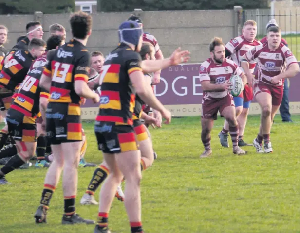  ?? Tim Taylor ?? ●●Travis Townsend leads the charge for Rochdale in the clash against Southport at the weekend