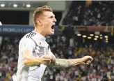  ?? Frank Augstein / Associated Press ?? Kroos, who plays for Real Madrid, atoned for an early mistake that led to Sweden’s goal in the first half. Germany came back from the 1-0 deficit.