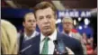  ?? MATT ROURKE / THE ASSOCIATED PRESS ?? Former Trump Campaign Chairman Paul Manafort talks to reporters on the floor of the Republican National Convention at Quicken Loans Arena in Cleveland.